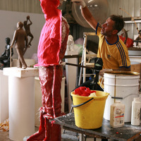 19. fibreglass being layered on felt